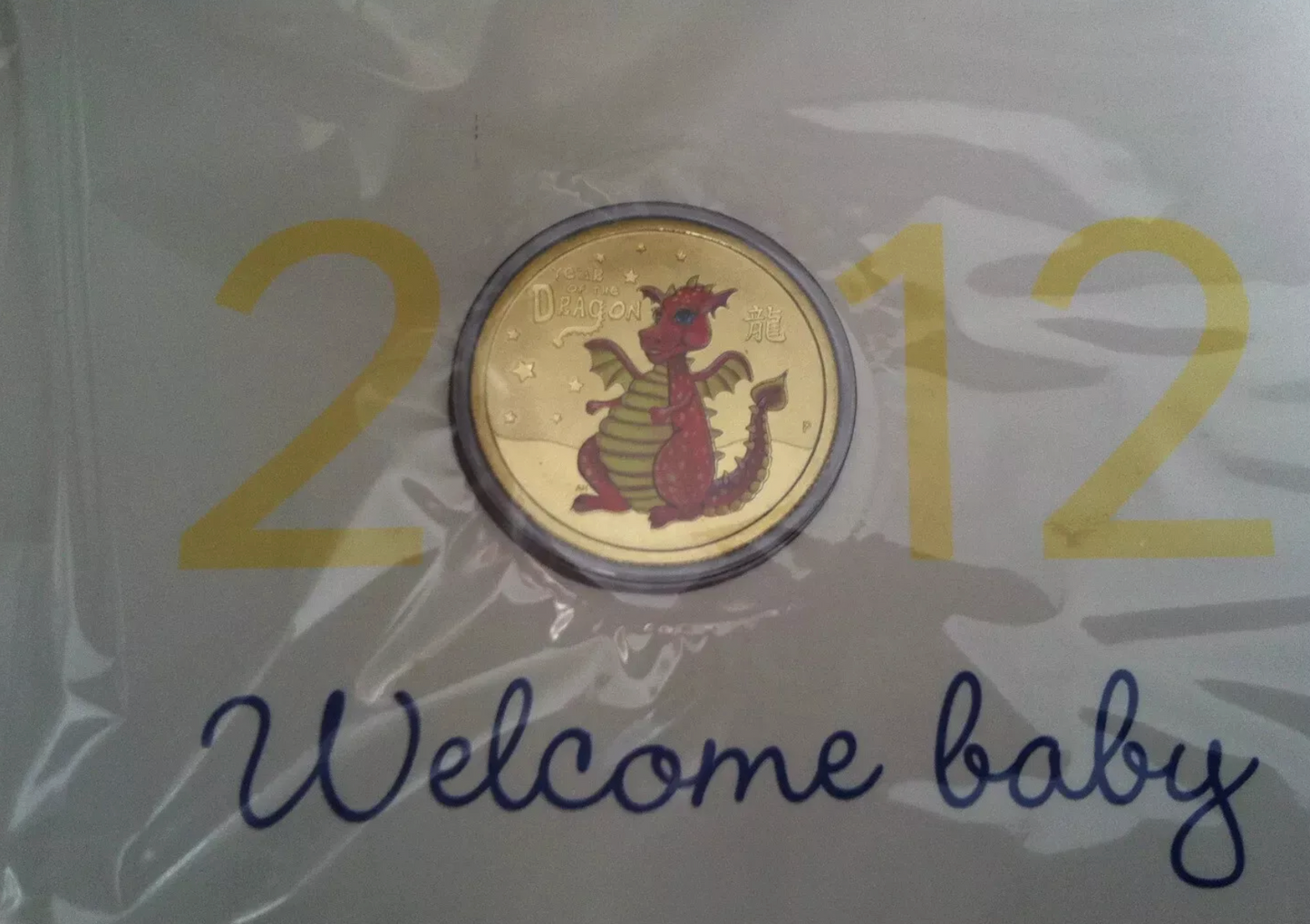 2012 UNC $1 Baby Keepsake Year of the Dragon Coloured Coin – in Presentation Card